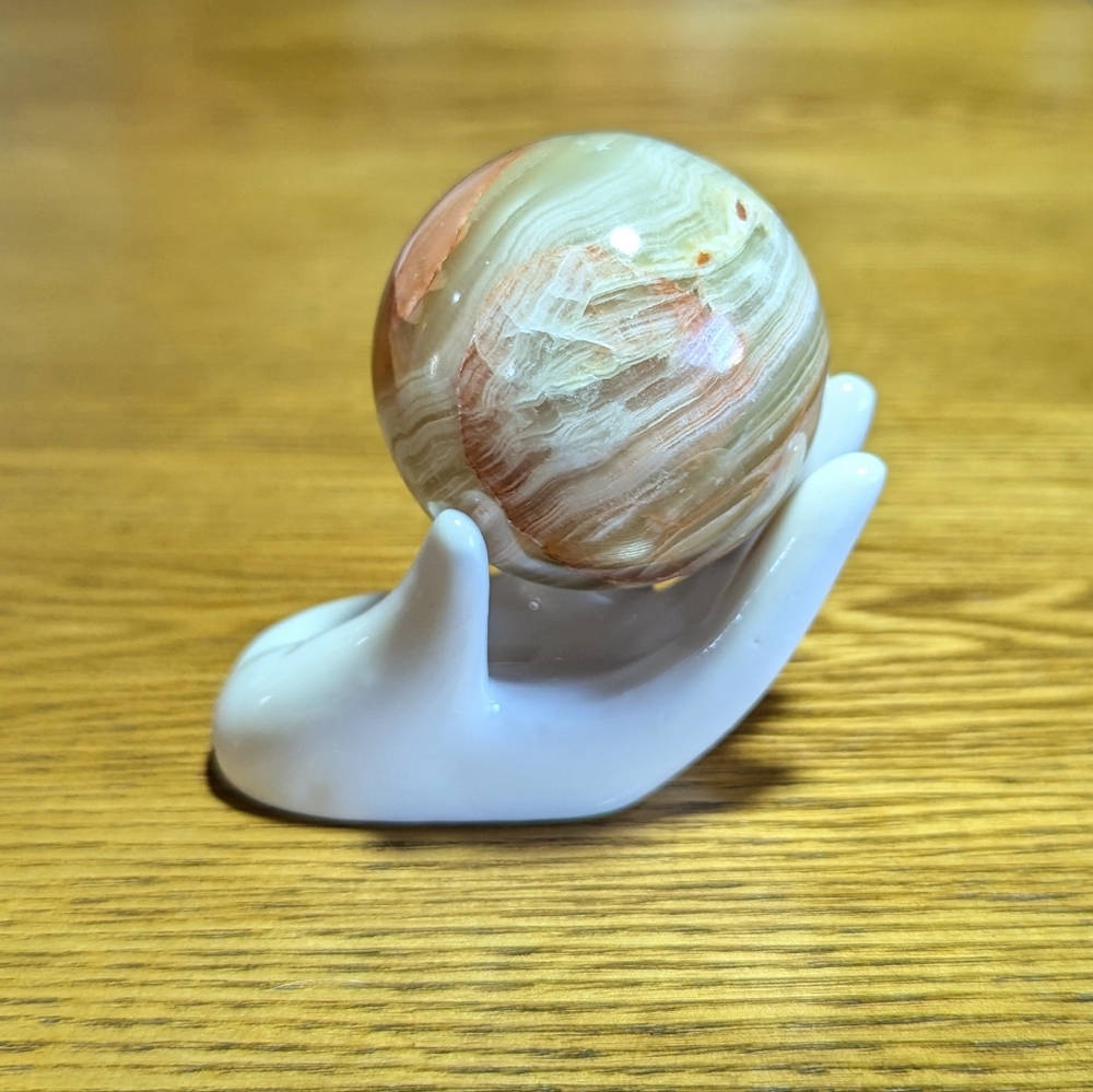 Green Onyx Sphere with Porcelain Hand